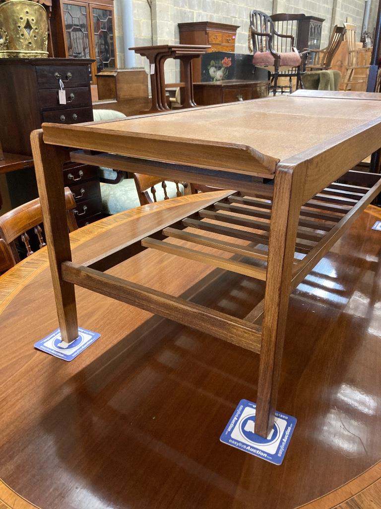 A Rempley teak sliding top coffee table, circa 1970